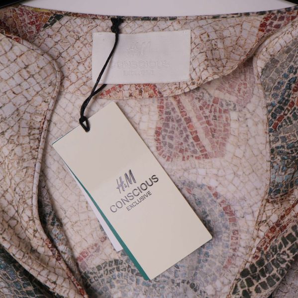 Etikett från H&M Conscious Exclusive
