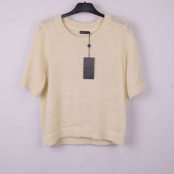 Beige stickad kortärmad topp på galge
