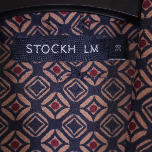 Detalj av logga och storlek