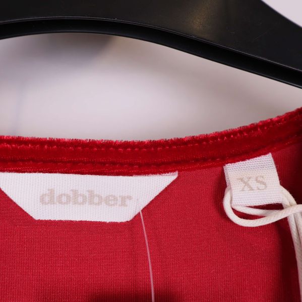 Dobber-logga och storlekslapp