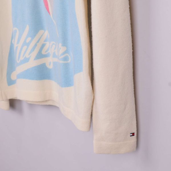 Ärmslut med liten Tommy Hilfiger-flagga broderad på mudden