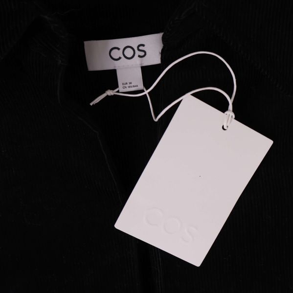 COS-märke och produktetikett