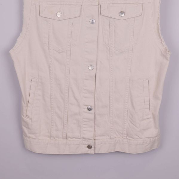 Nederdel av beige jeansväst med kanter och fickor