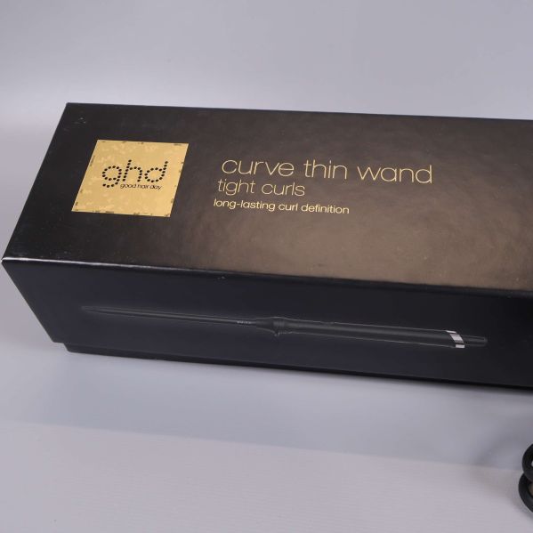 Originalförpackning med ghd-logo och produktnamn