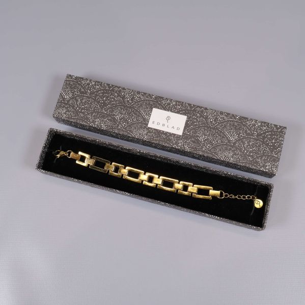 Armband och ask med Edblad-logga på locket
