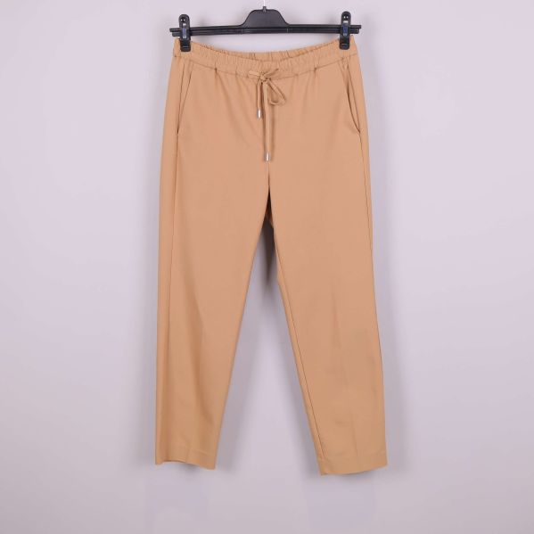 Beige byxa med resår och dragsko framtill