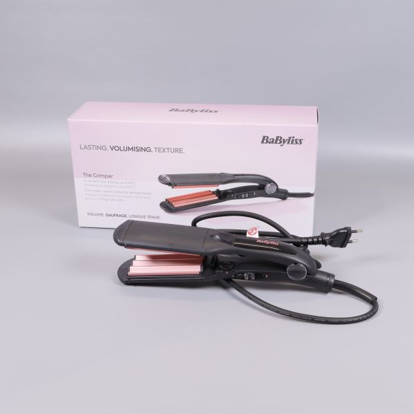 BaByliss våffeltång framför sin originalförpackning