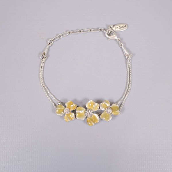 Silverfärgat armband med tre gulvita blommor