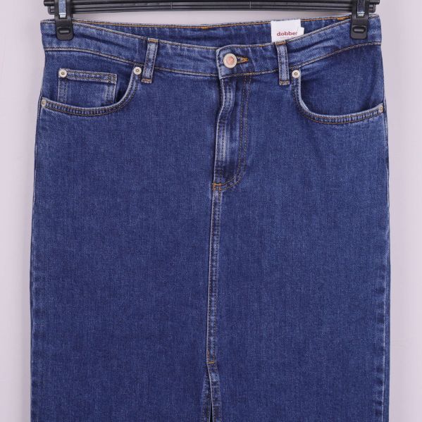 Övre del av denimkjol med synliga fickor och knapp