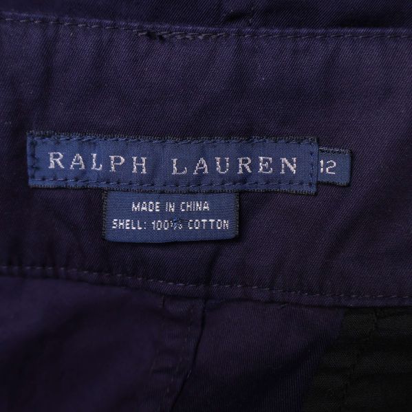 Ralph Lauren-märkning och materiallapp i kjol