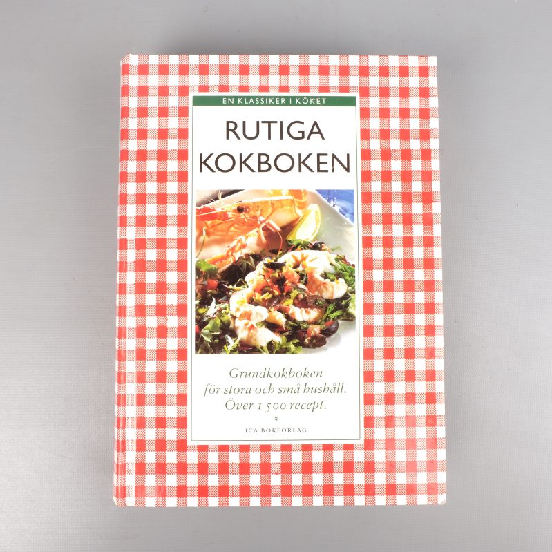 Framsidan av Rutiga kokboken med rött rutigt mönster