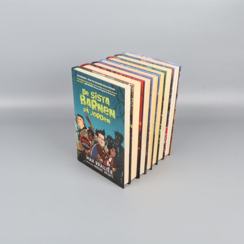 Sju böcker i serie De sista barnen på jorden stående på rad