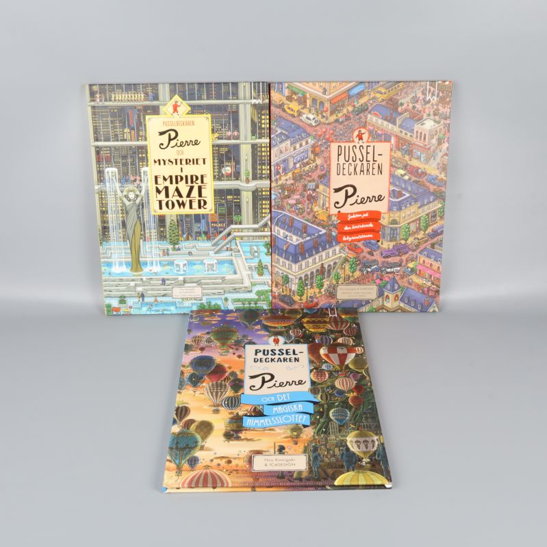 Tre illustrerade böcker om Pierre stående 