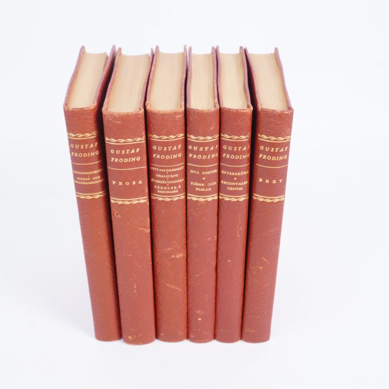 Ryggar av sex böcker med texten Gustaf Fröding och boktitlar