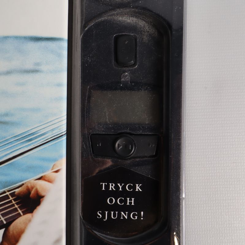 Närbild på bokens ljudmodul med knappar