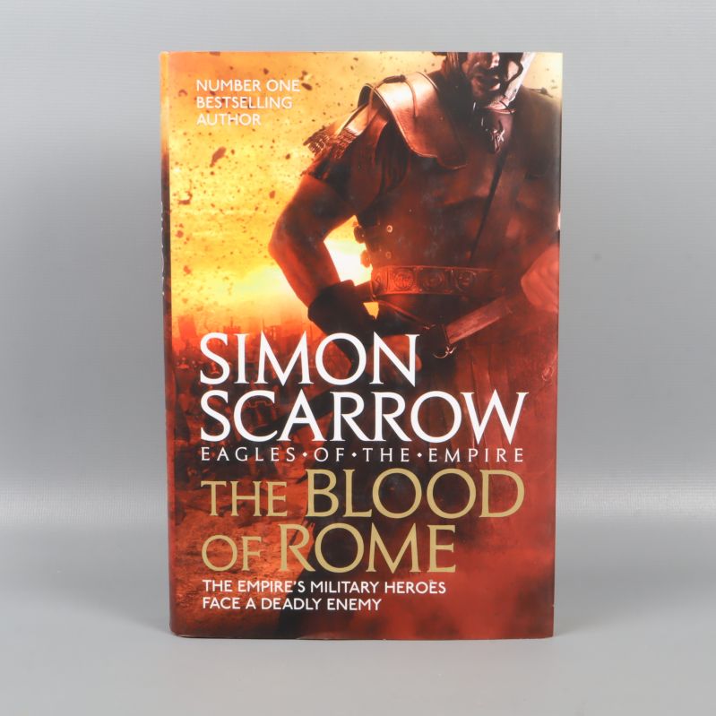Framsidan av The blood of Rome med tydlig titel och omslagsbild av en romersk soldat