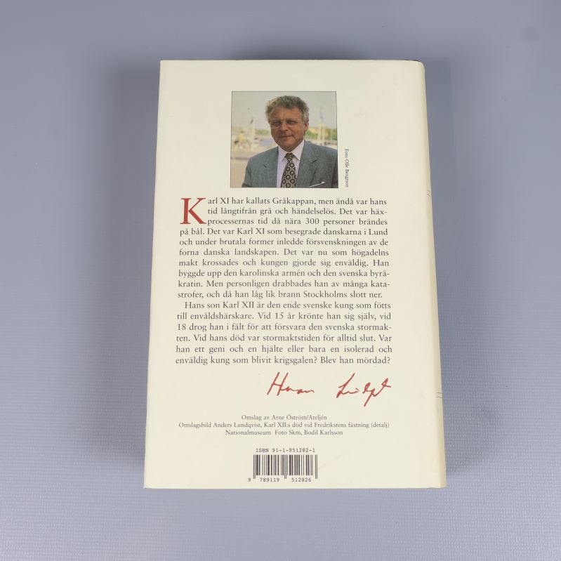 Baksida av Storhet och Fall