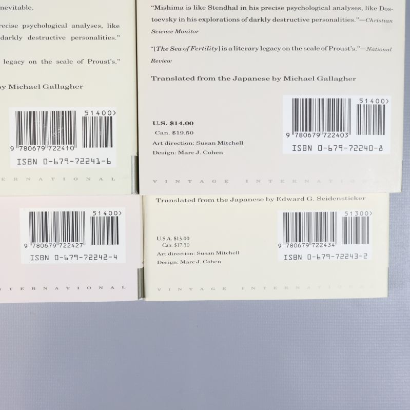 Närbild på ISBN och streckkoder på baksidor av The Sea of Fertility-böcker