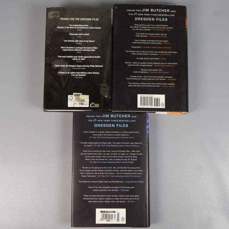 Baksidor av böckerna Cold Days, Skin Game och Peace Talks ur Dresden files-serien