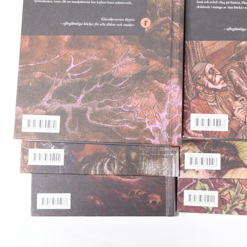 Baksidor av böcker med ISBN-streckkoder tydligt synliga