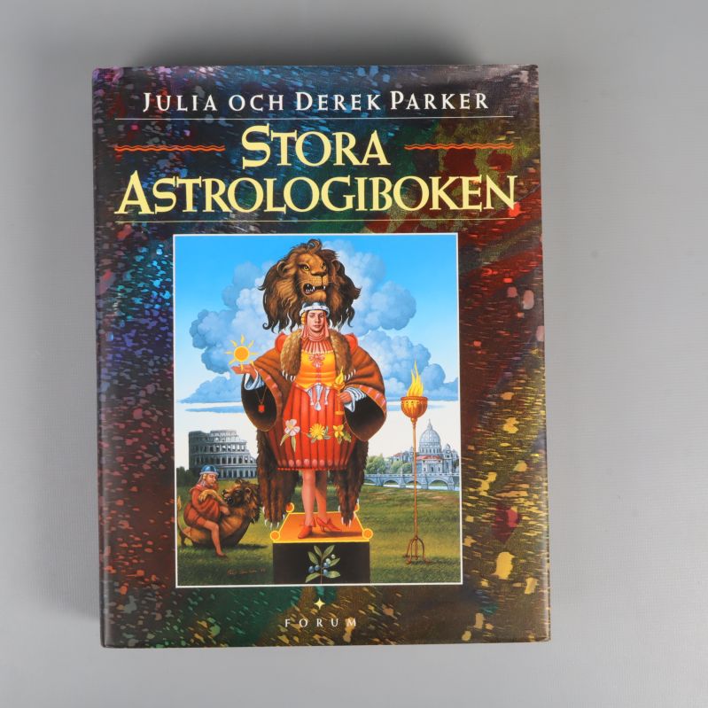 Framsidan av Stora astrologiboken med färgstark illustration och titel