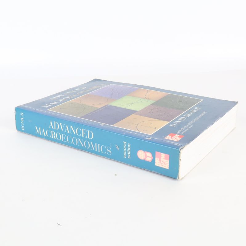 Bok Advanced Macroeconomics liggande med synlig ryggtext och böjda hörn