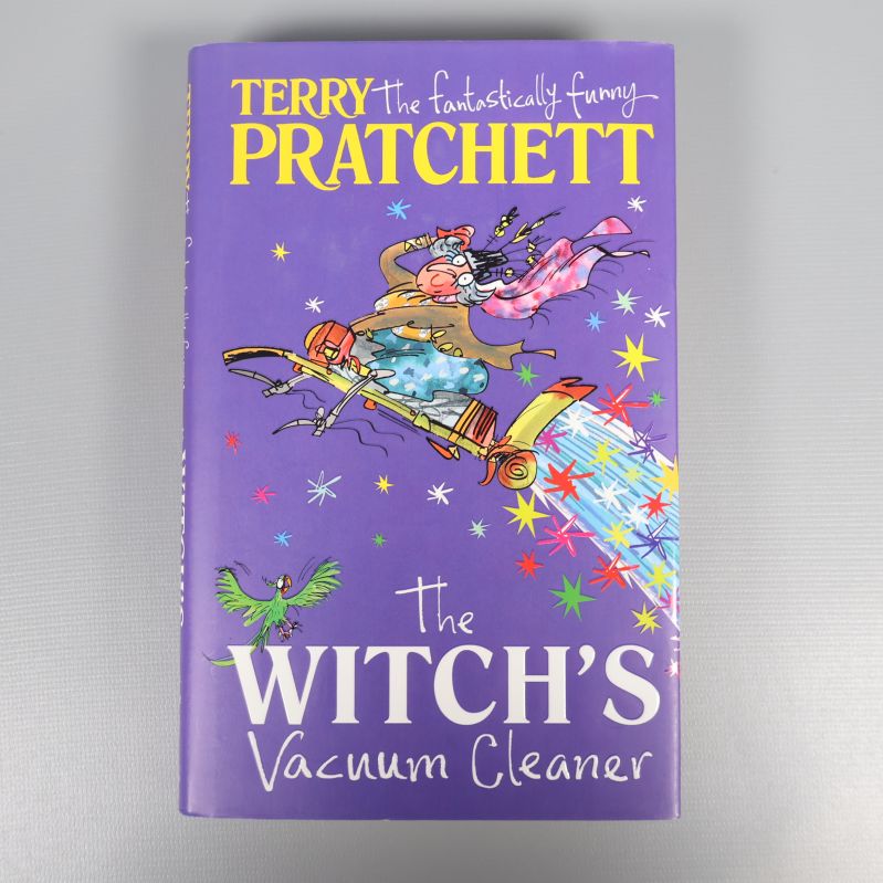 Framsidan av boken The Witch's Vacuum Cleaner med färgglad illustration