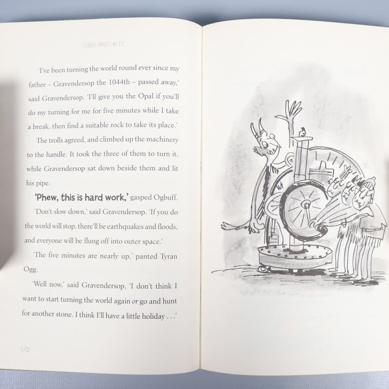 Uppslag ur boken med teckning och engelsk text