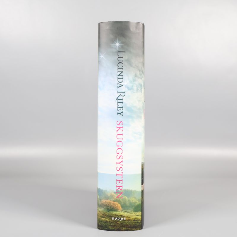 Bokrygg till Skuggsystern del 3 av Lucinda Riley med tydlig titel och författarnamn