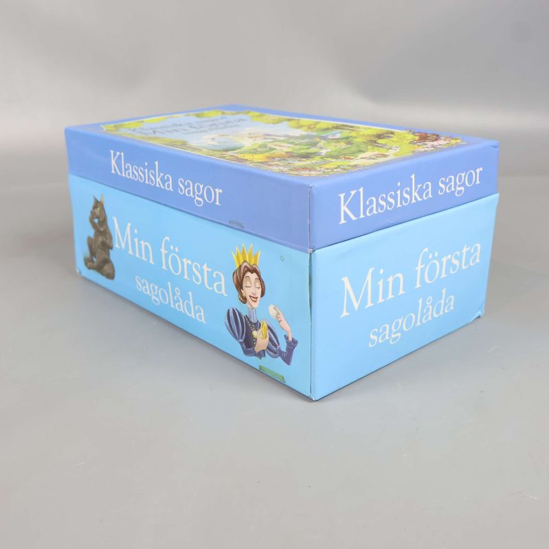 Sagolåda med illustrationer av sagokaraktärer på sidan