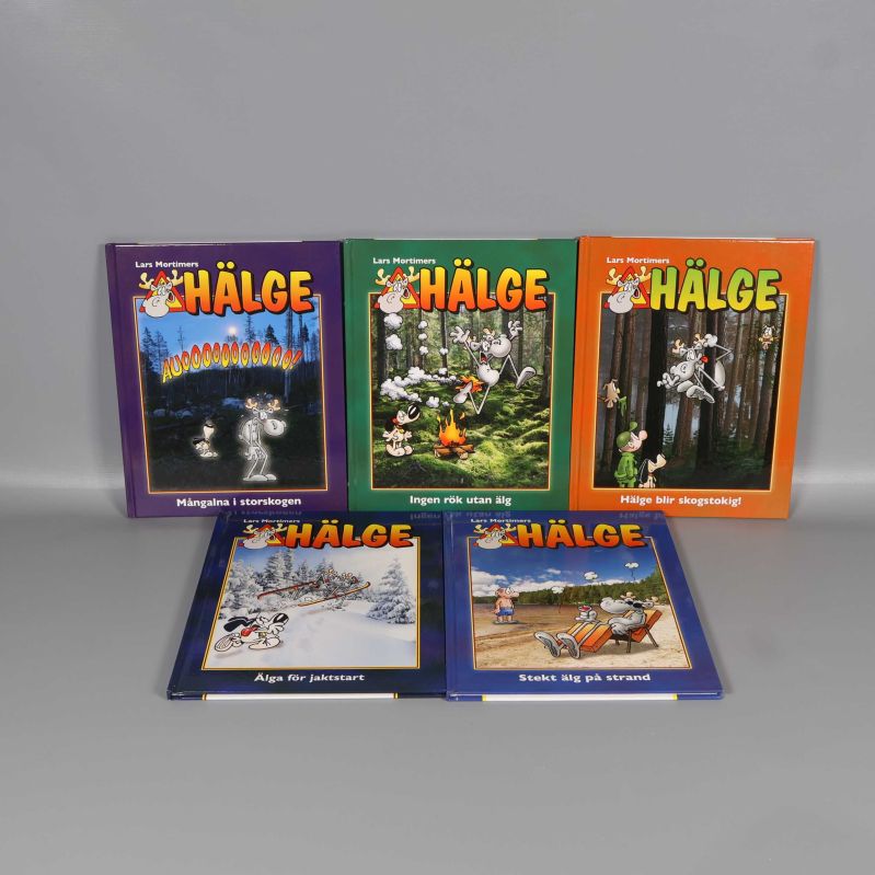 Fem Hälge-serieböcker med olika färgglada omslag