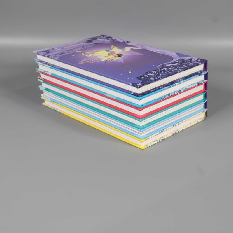 Bokpaketet staplat i profil med färgglada kanter och omslag