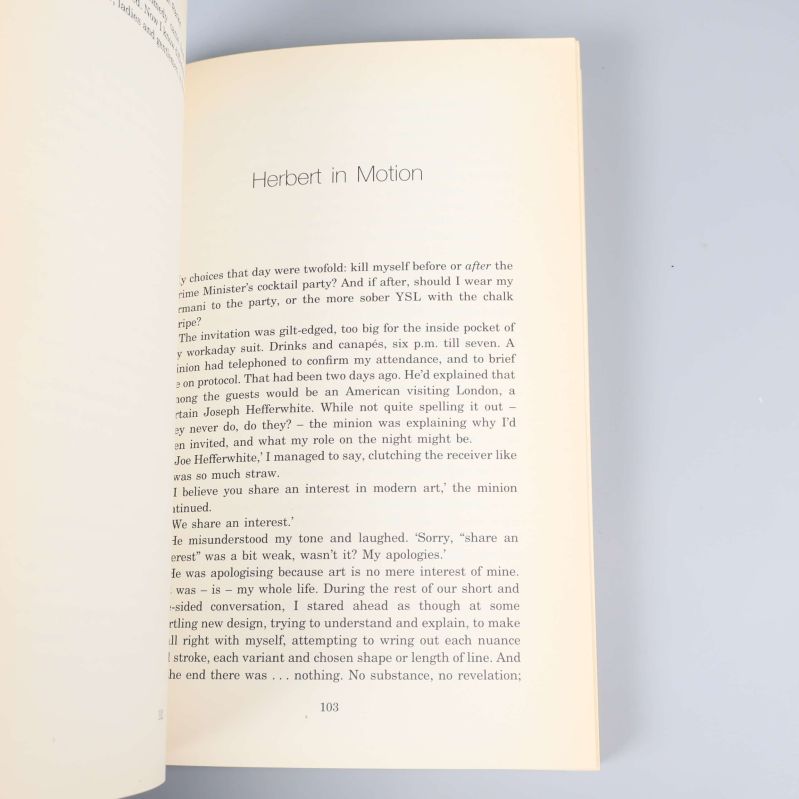 Uppslag med textsidan Herbert in Motion synlig