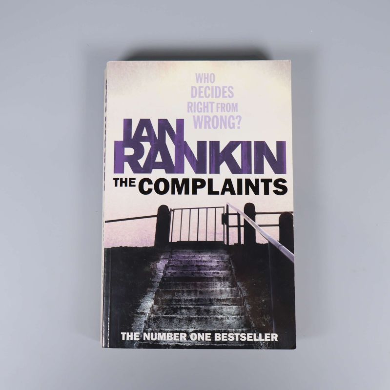 Framsida av boken The Complaints av Ian Rankin med trappa och stängsel
