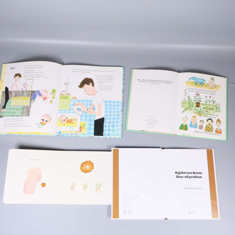 Uppslag ur fyra böcker med färgglada illustrationer