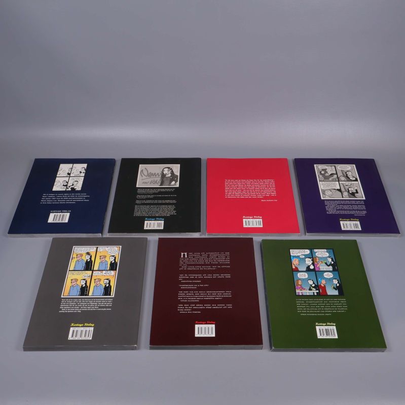 Baksidor av sju Nemi-album med olika layouter och serierutor