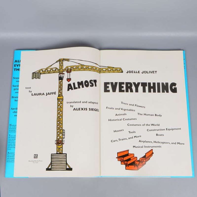 Uppslag från Almost Everything som visar titel, kran och olika teman