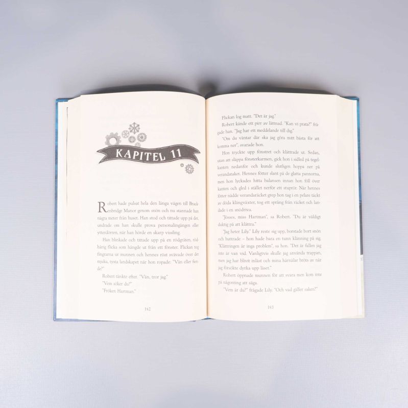 Uppslag ur kapitel i en av böckerna ur Hartmans magiska värld