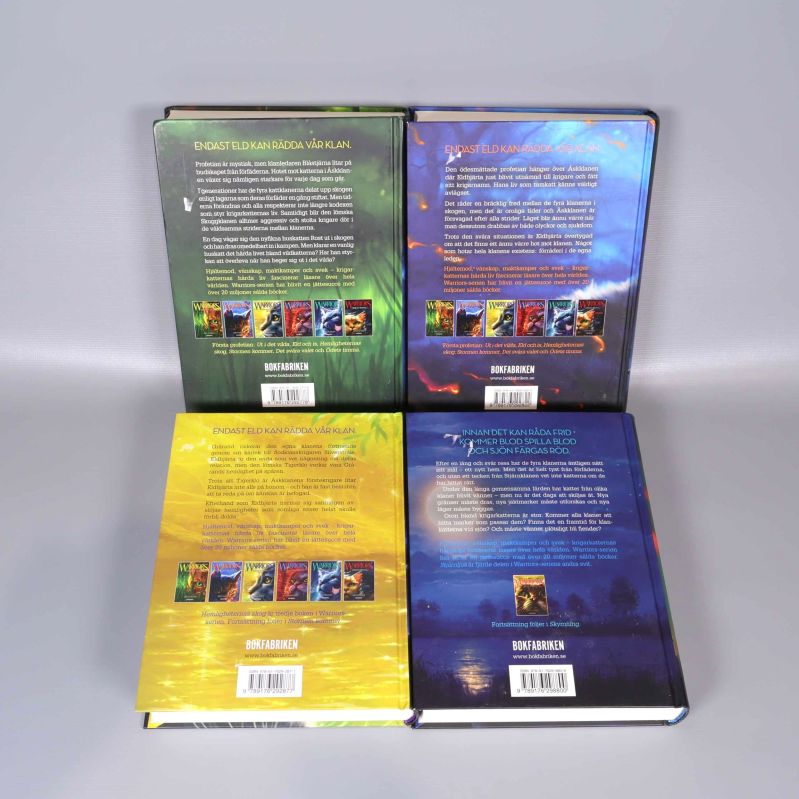 Baksidor av fyra Warriors-böcker med beskrivningar och ISBN