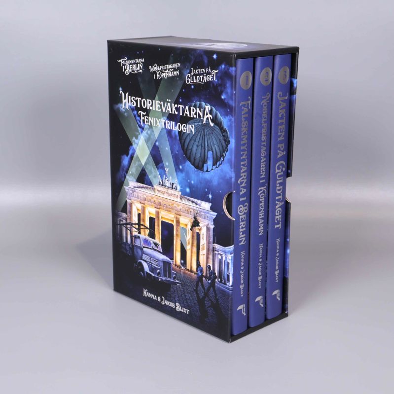 Bokbox med Historieväktarna Fenixtrilogin och tre böcker