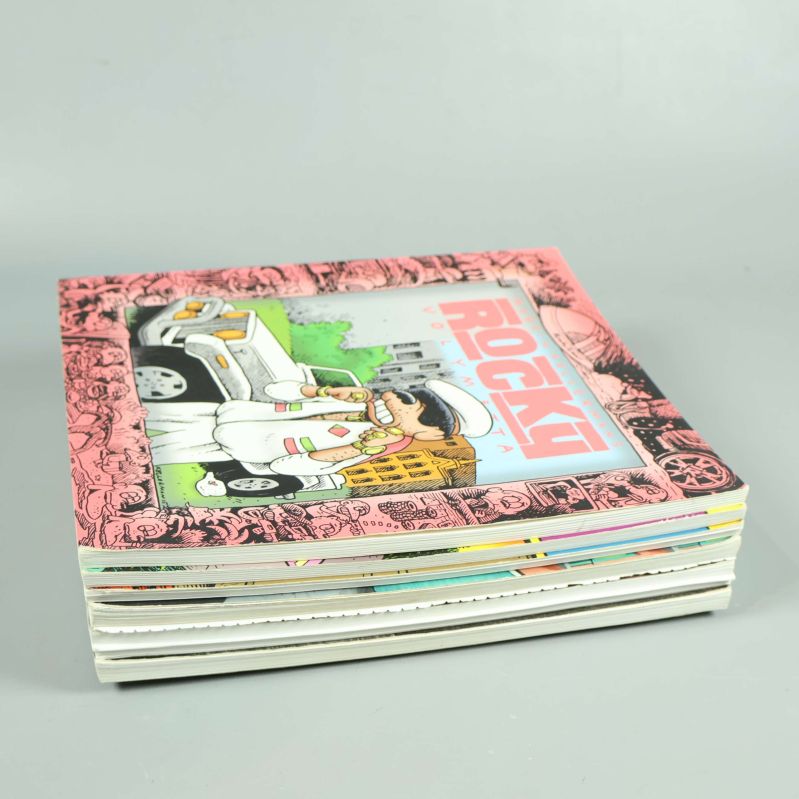 Sex Rocky-böcker på hög, färgglada omslag synliga