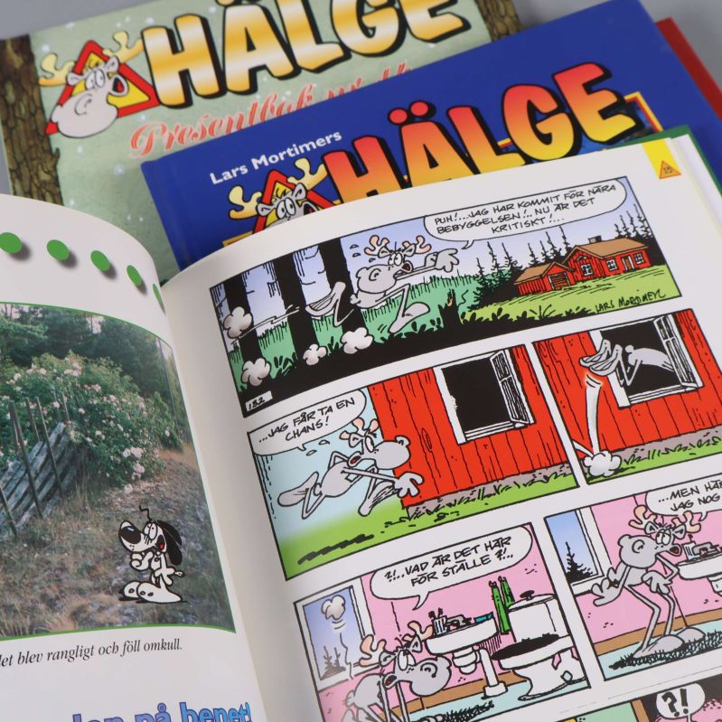 Uppslag med färglagd seriestrip och foto från Hälge-album