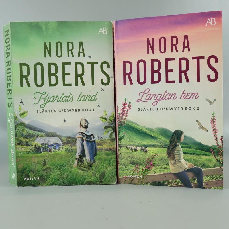 Framsidor på pocketböckerna Hjärtats land och Längtan hem av Nora Roberts