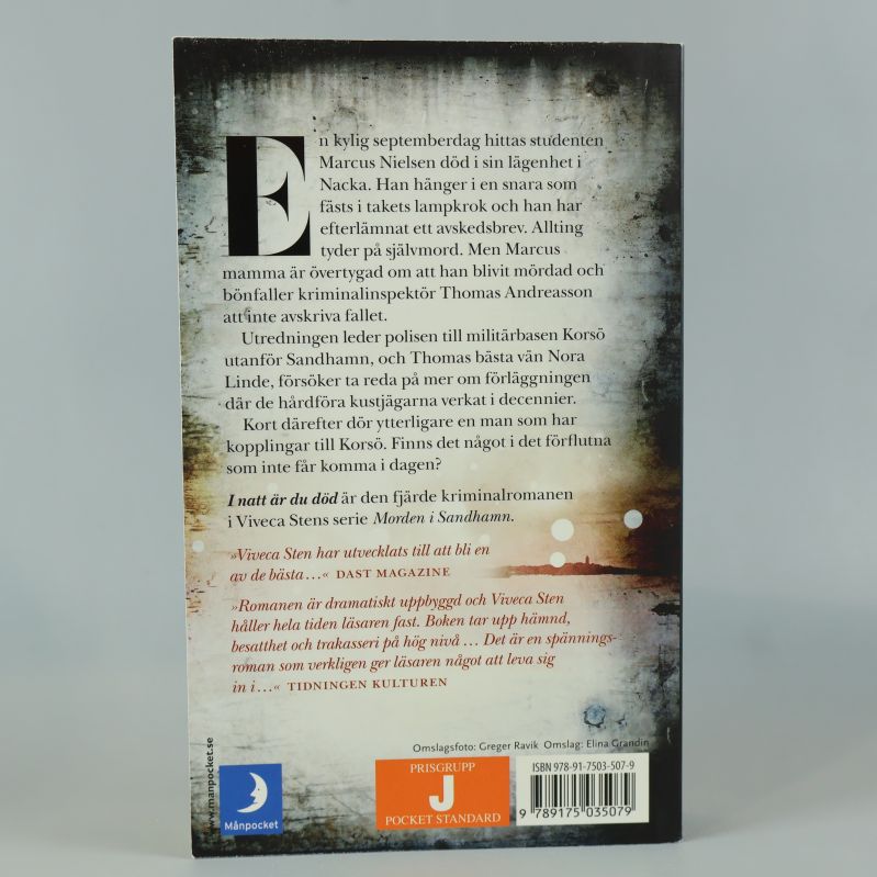 Baksidan av boken med beskrivning och ISBN