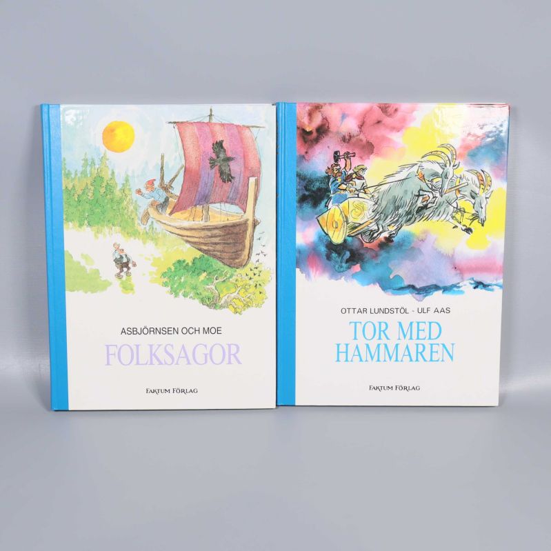 Två illustrerade sagoböcker, Folksagor och Tor med hammaren, med färgglada omslag