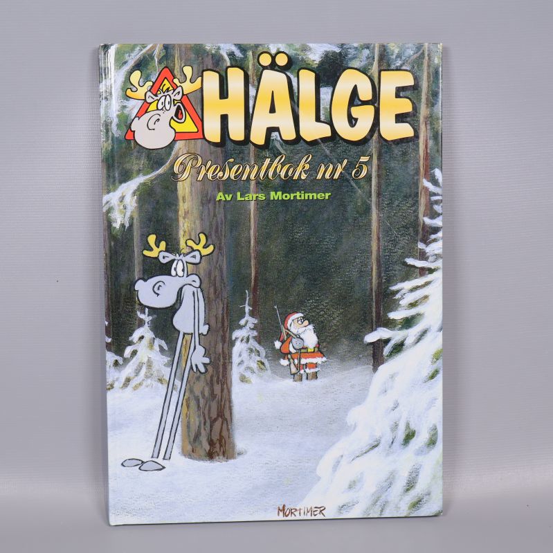 Framsida på Hälge presentbok nr 5 med Hälge och tomten
