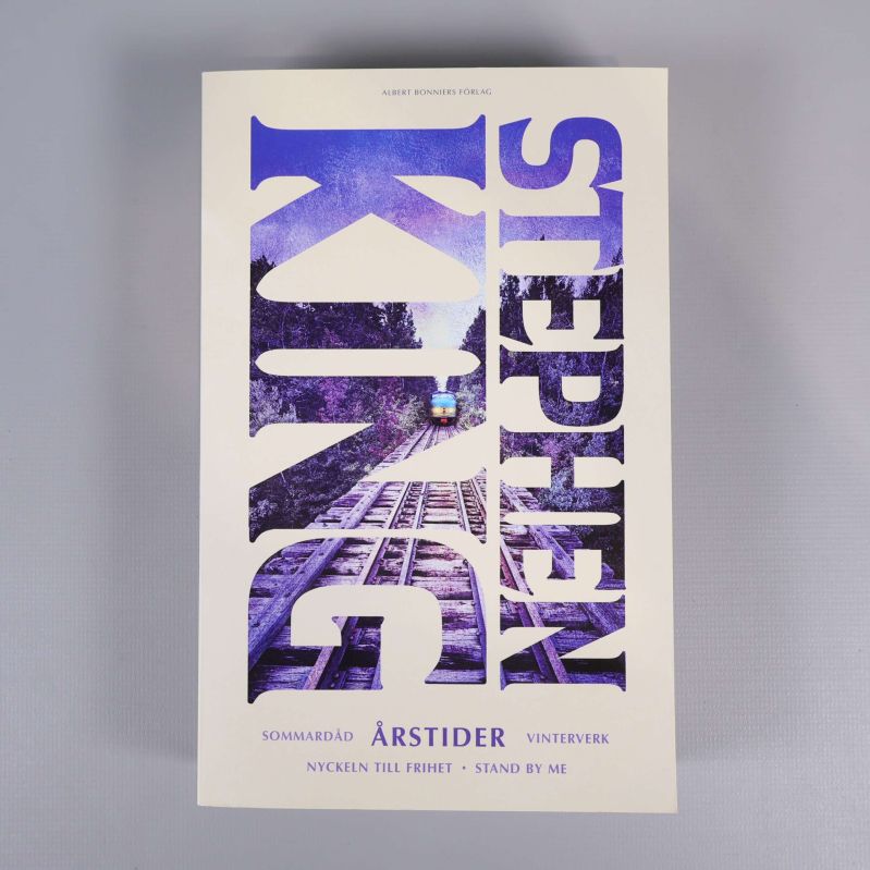 Framsida av Årstider av Stephen King med lila typografi