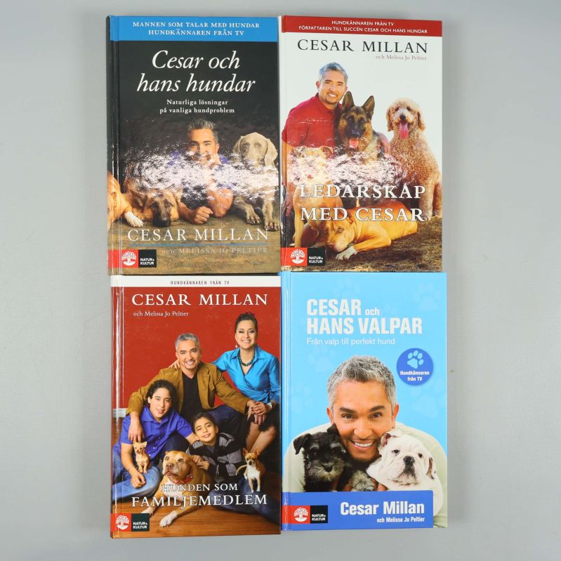 Fyra böcker av Cesar Millan, framsidor med foton på hundar och författaren