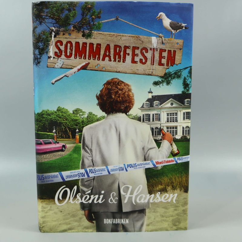 Framsidan av boken Sommarfesten med färgstarkt omslag och villa i bakgrunden