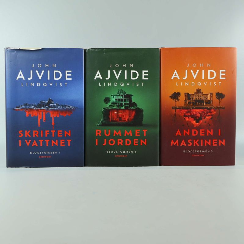 Tre böcker i serien Blodstormen av John Ajvide Lindqvist med färgstarka omslag